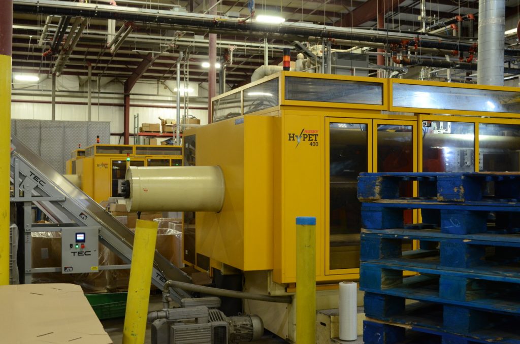 Husky HyPET 400 injection moulding system producing PET preforms at Ice River Springs